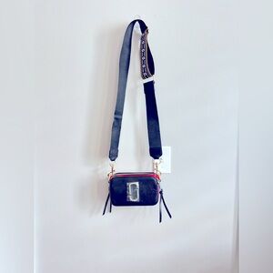 Crossbody bag with removal strap